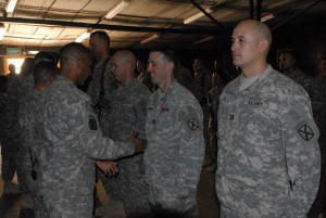 *Photo, right most, Captain Steven Lim's about to receive an award at HHC Award Ceremony, July 14, 2010, FOB Hammer, Iraq, 15 days after Manning is arrestedFrom 2nd Brigade Combat Team, 10th Mountain Division Facebook Profile
